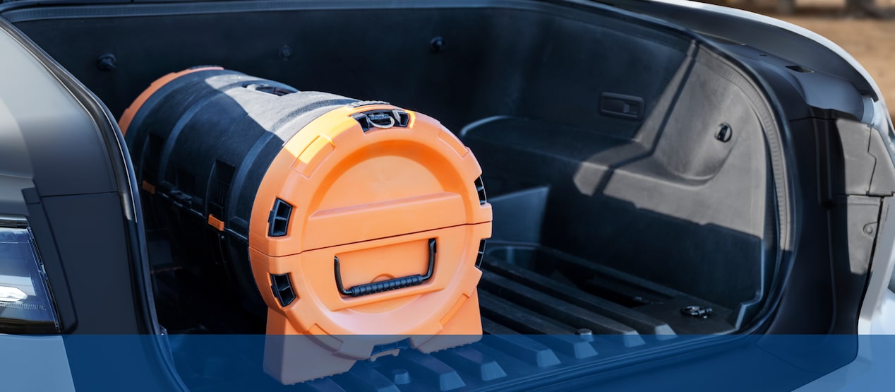 View of the lockable and weatherproof eTrunk compartment in the Electric Chevrolet Silverado