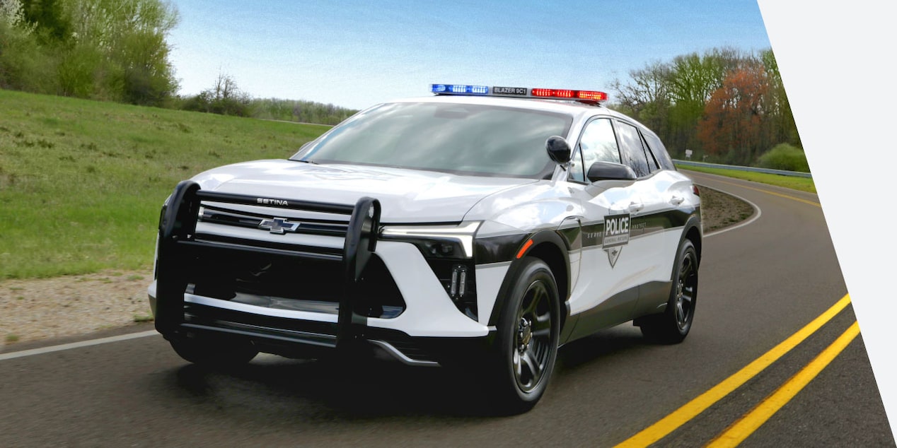 Close-up of the 2024 Blazer EV PPV Driving on an Empty Road