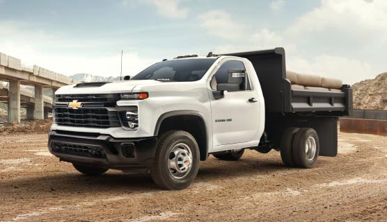 A Chevrolet Chassis Cab Truck with a Full Bed at a Worksite