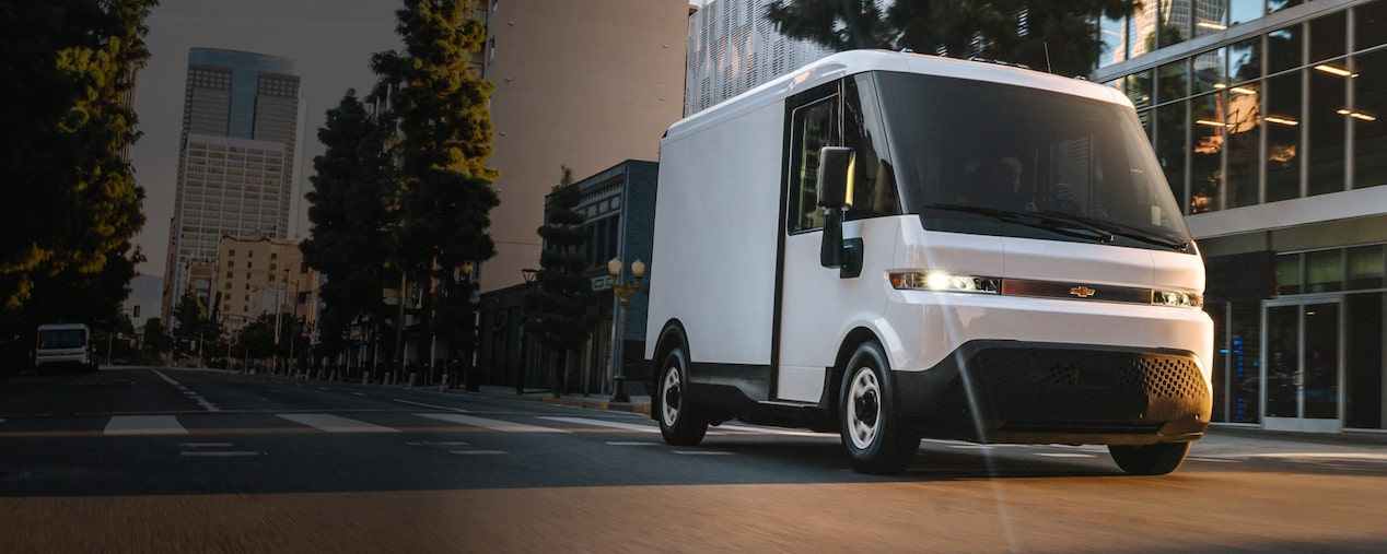 A 2025 Chevrolet Brightdrop driving down a city street.