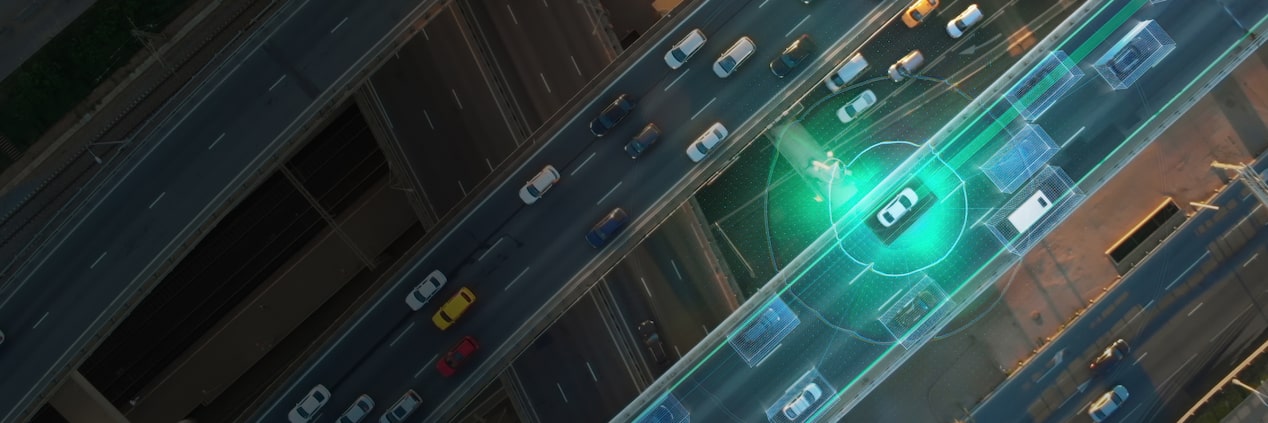 Overhead shot of Car Driving down freeway with safety detection tracking