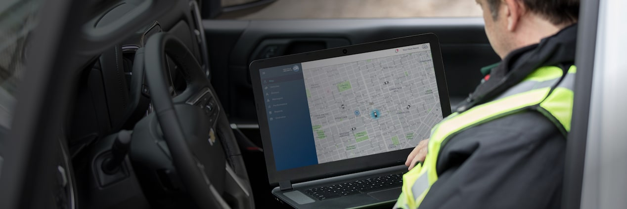 Side shot of map screen on computer inside of a vehicle