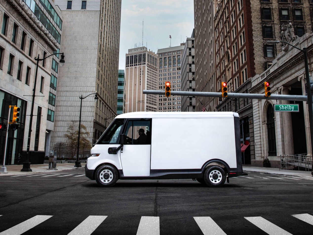 A left-facing profile shot of the 2024 Chevrolet Brightdrop stopped within an intersection