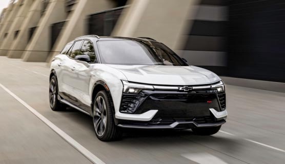 A Chevy Blazer EV Driving on an Urban Road