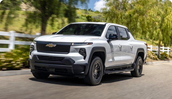 Front Three-Quarters View of the Chevrolet Silverado EV Driving on a Road