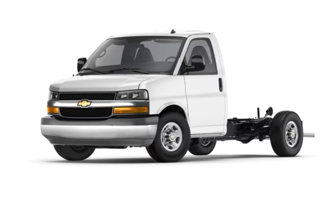 A three-quarter shot of a white 2023 Chevrolet Express